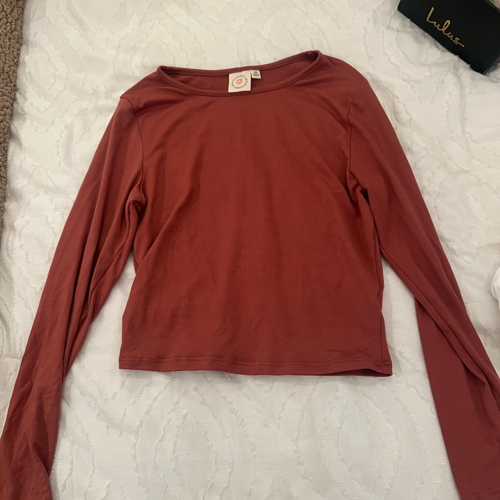 Xs top.can fit small or medium